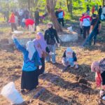 ASN Pemko Banjarmasin bersama dan masyarakat menggelar aksi gotong royong Pulau Insan. Foto-El Muhammad